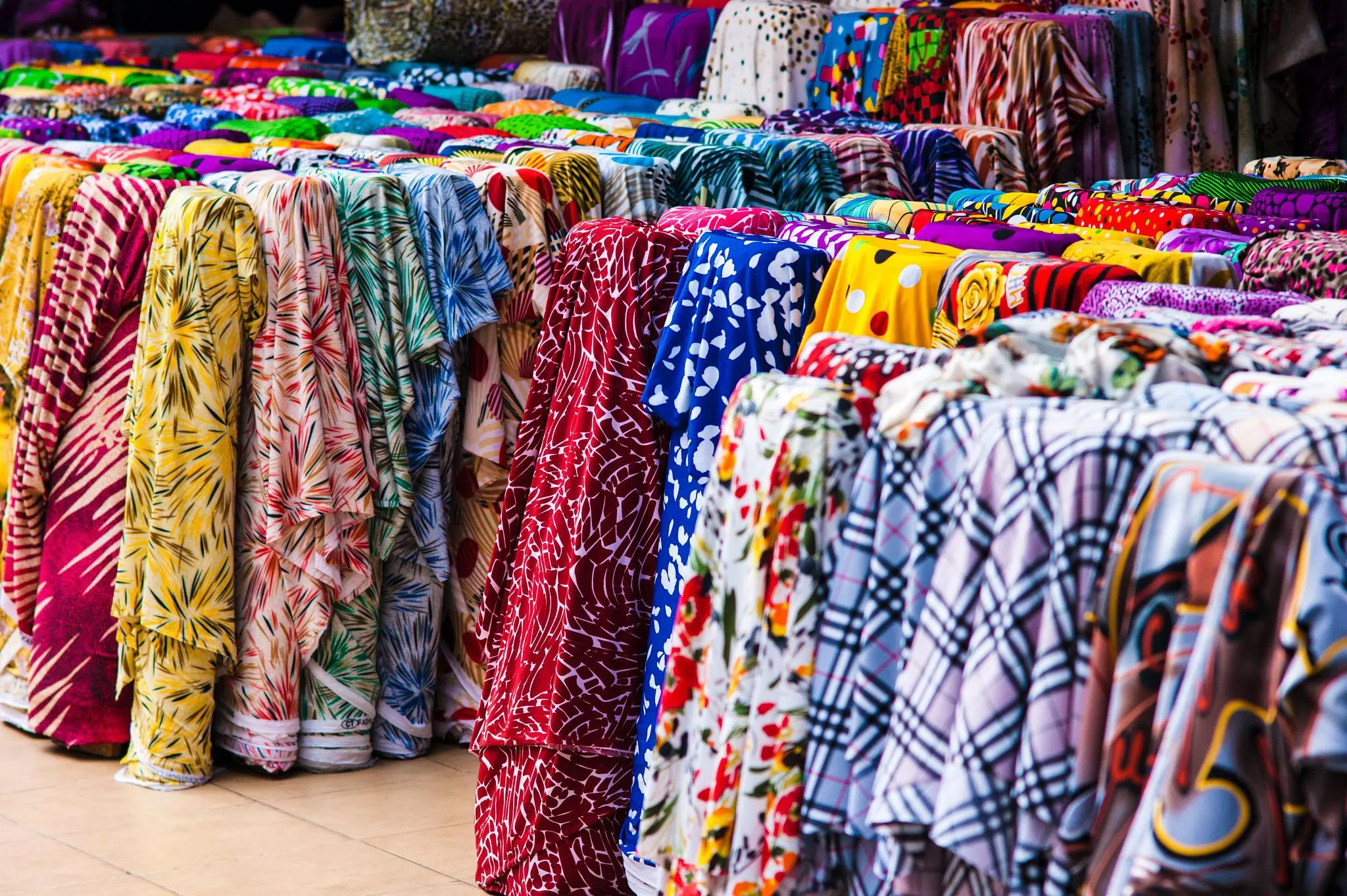 Traditional fabric market connected to Hoi An tailoring trade