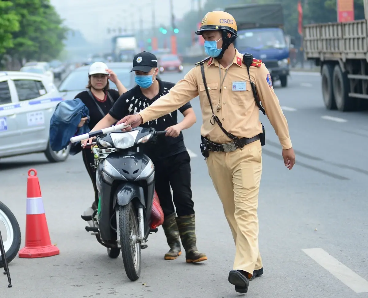 Traffic police in Ho Chi Minh City very often stop motorbikes for checking