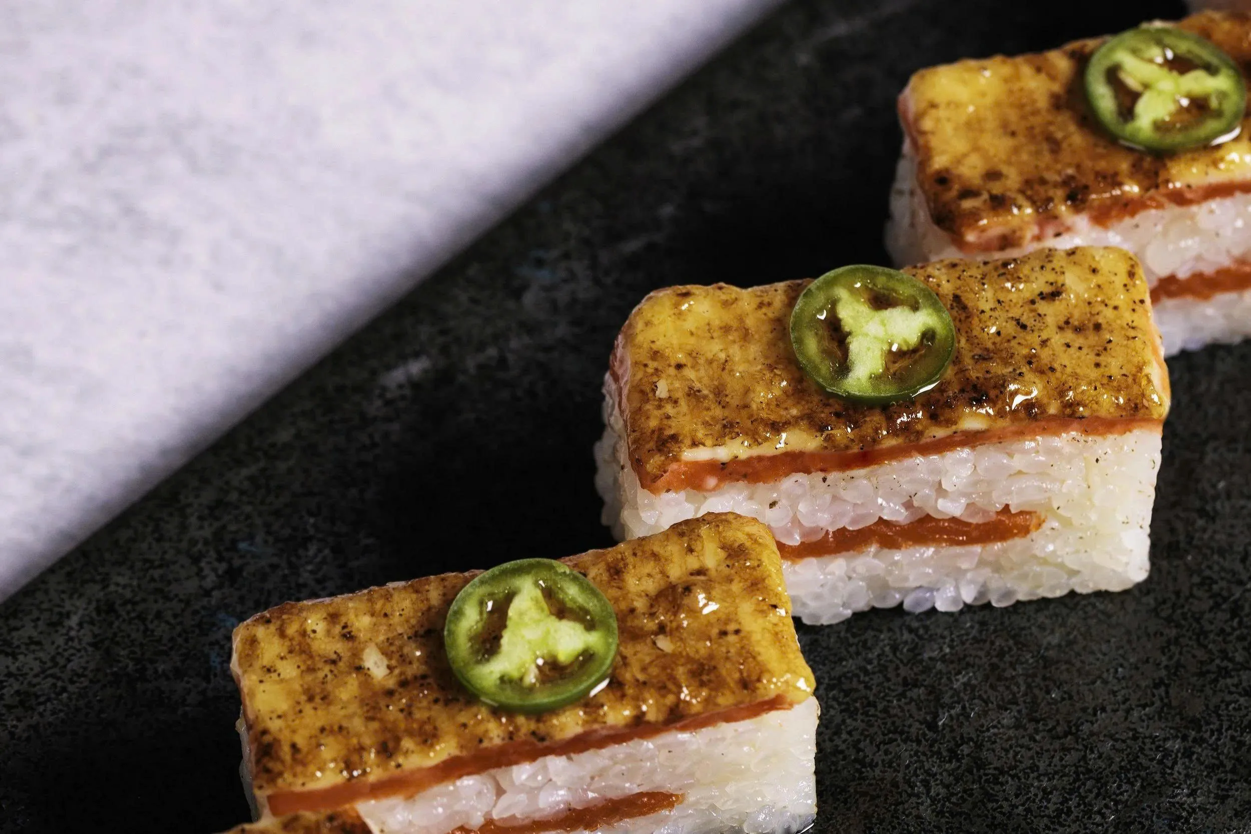 Aburi Salmon Oshizushi (pressed seared salmon sushi)
