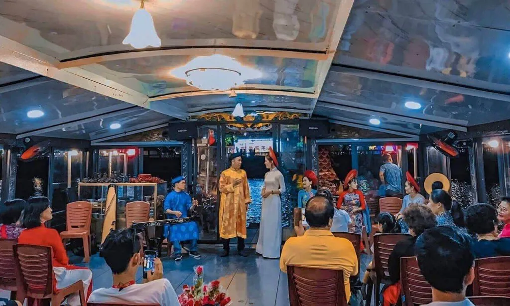 Enjoying Hue Royal Court Music on the Perfume River is an indispensable part.