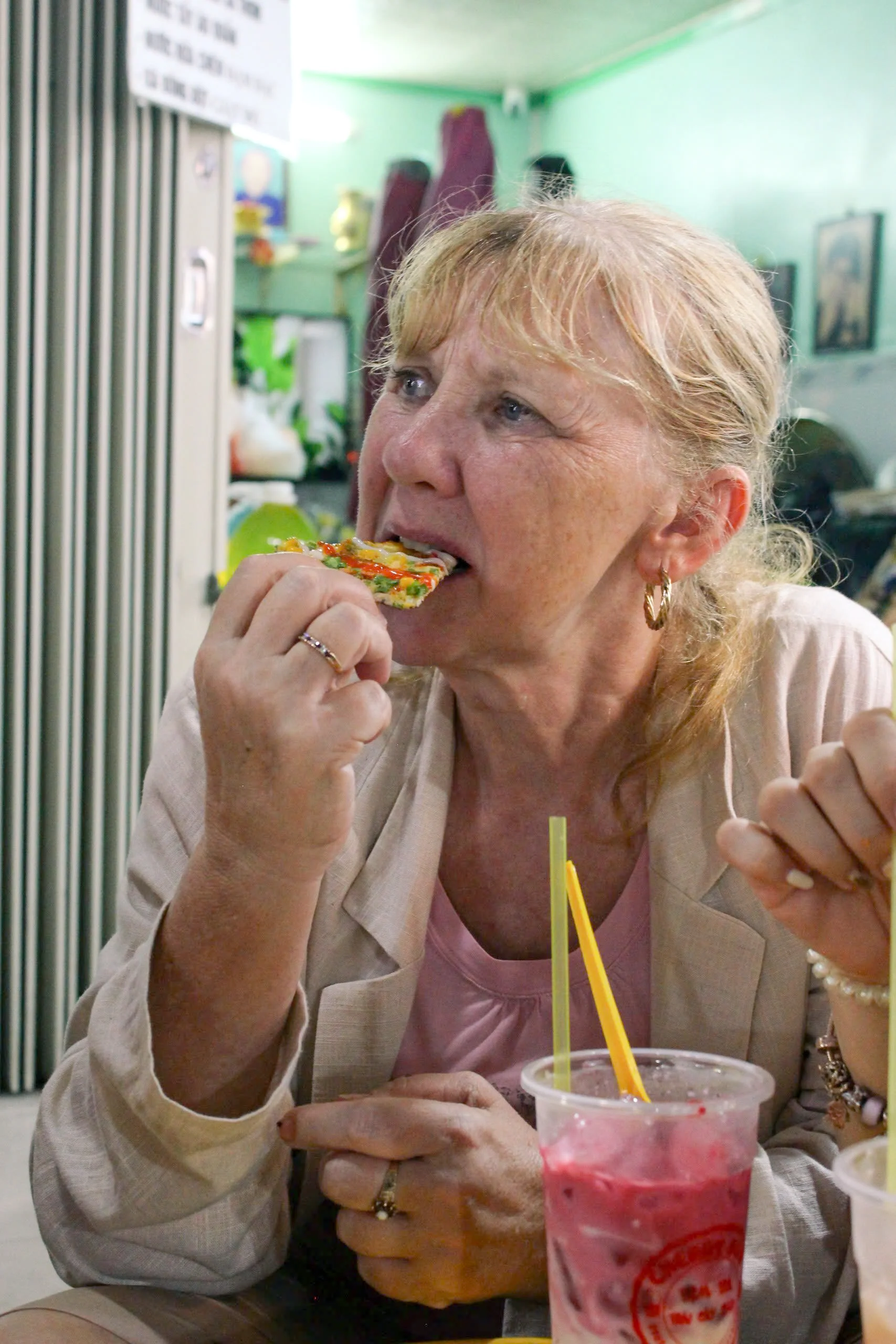Banh trang nuong - Grilled rice paper stuffed with eggs, spring onions and other savory toppings