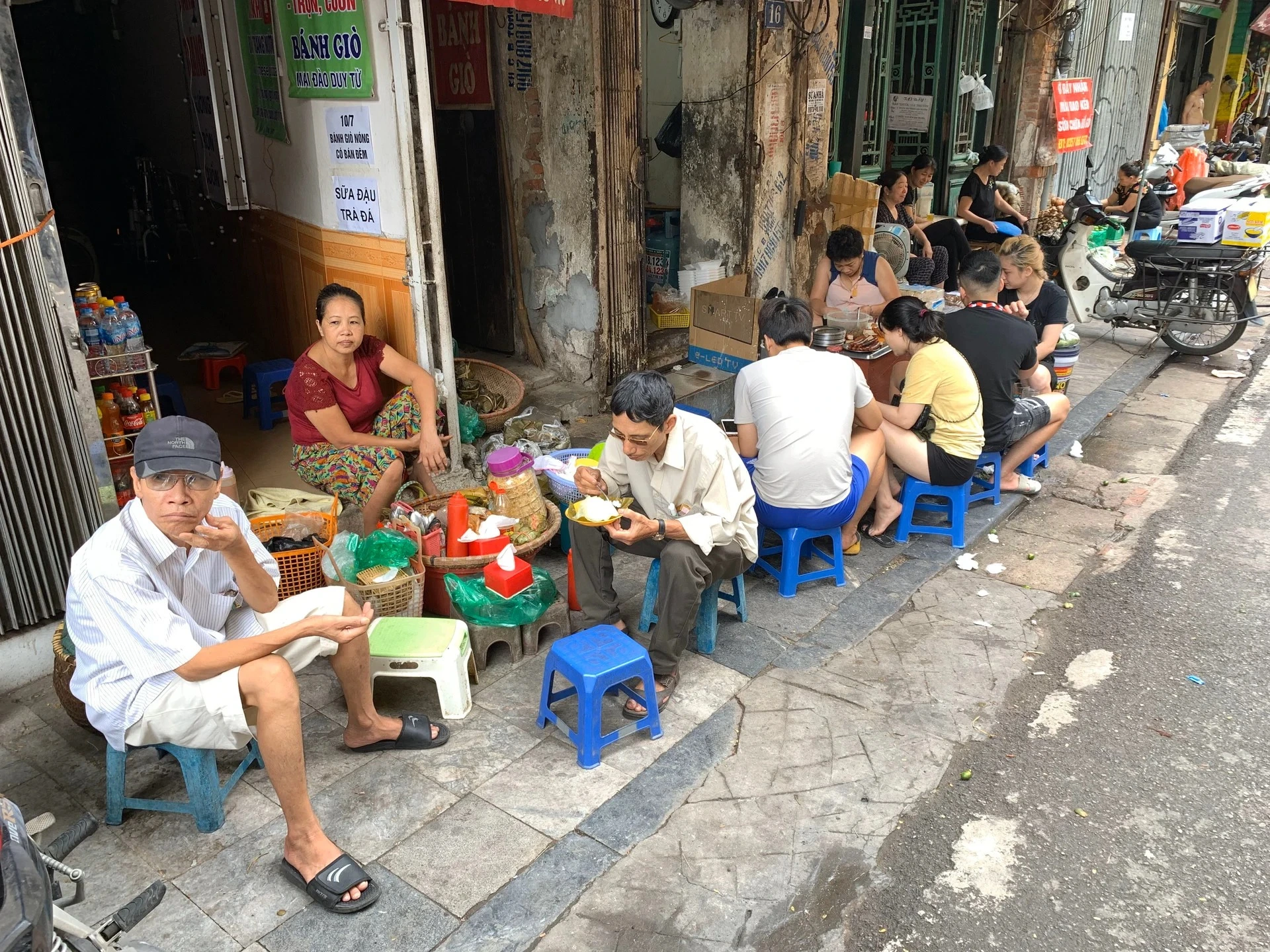 locals eating breakfast on the street in Vietnam