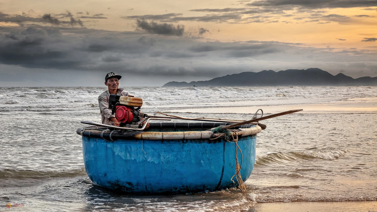 Fishing boats returning to shore in Long Hai coastal town