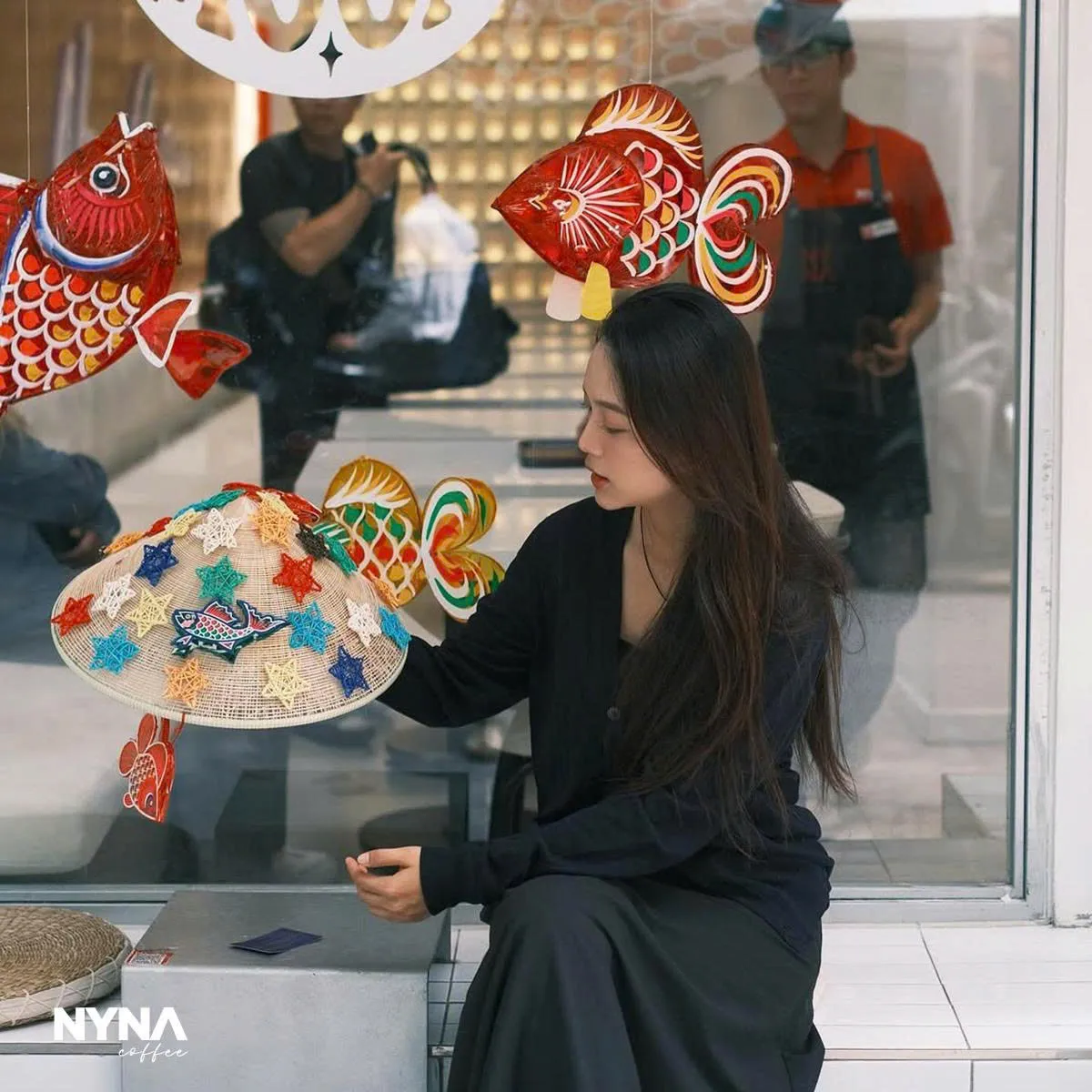 Selfies with the vibrant lanterns at Nyna Coffee