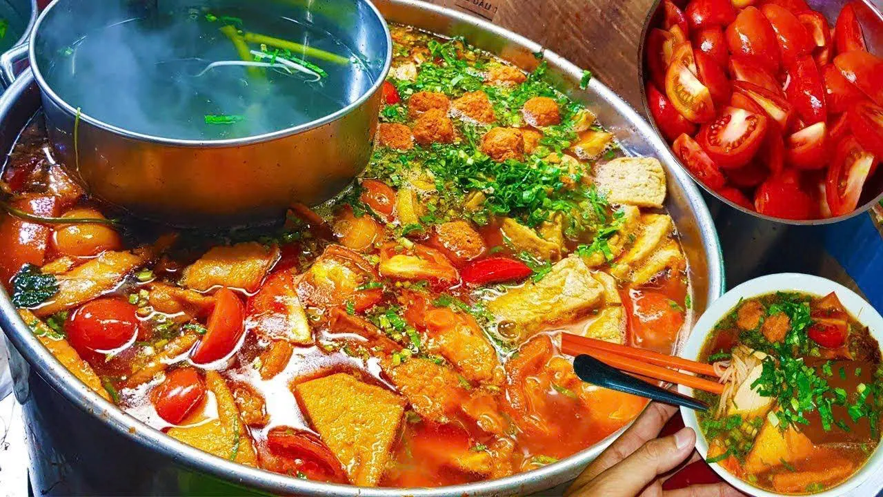 The broth of Vietnamese Bun Rieu 