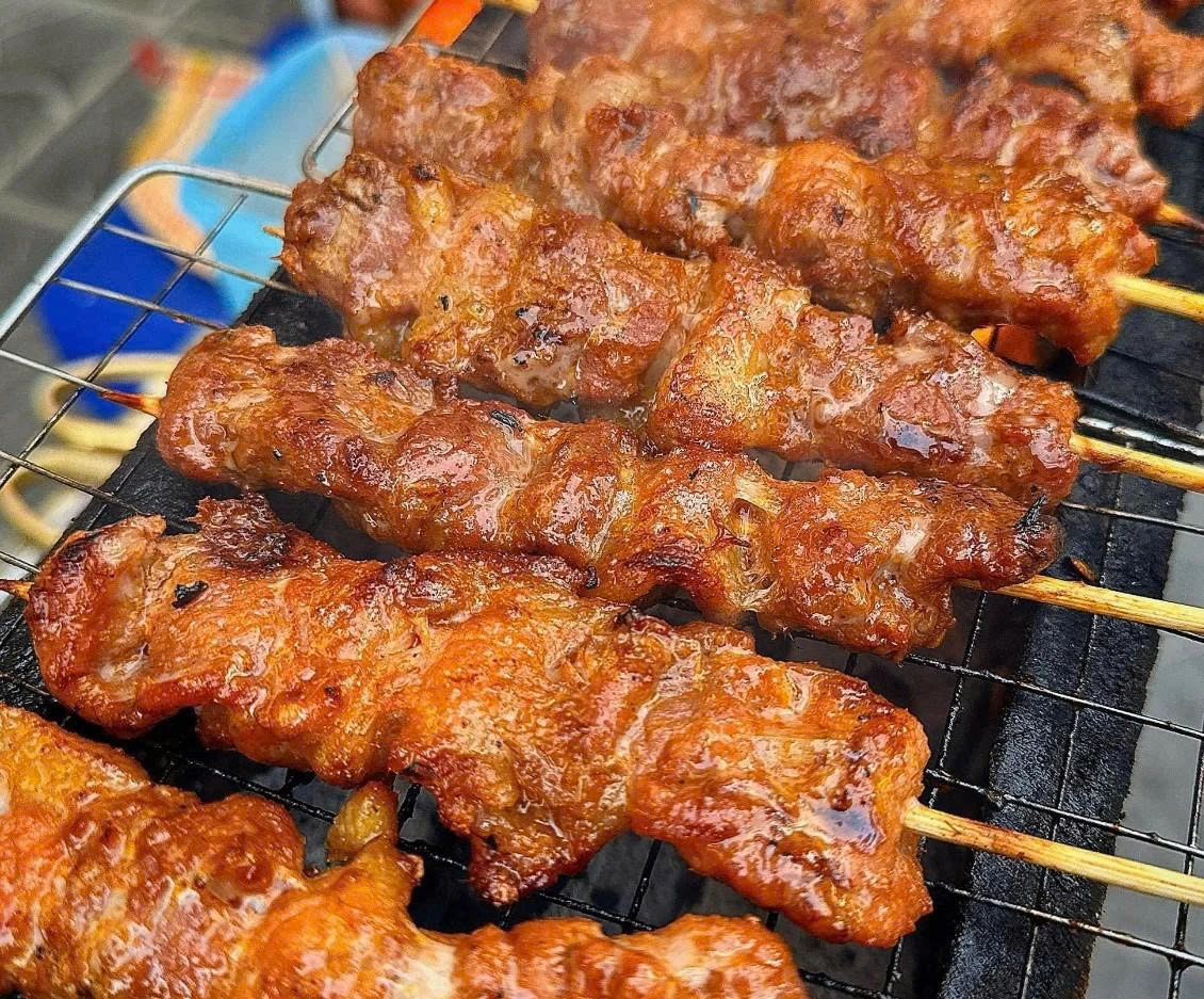 xien que nuong (grilled skewers) street food in saigon